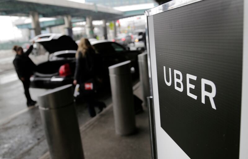 Uber said its revenue surged in the first quarter of the year, underpinned by a recovery in its ride-hailing and delivery businesses. AP