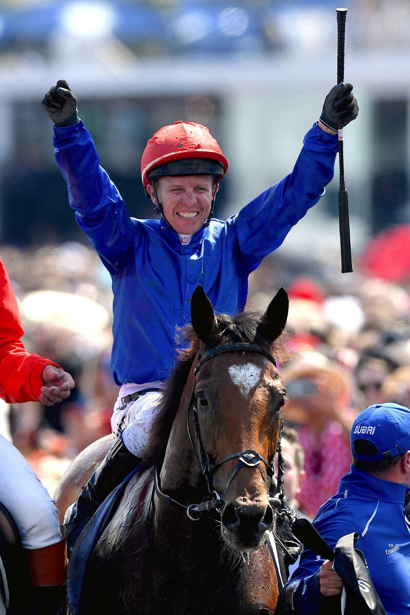 Jockey Kerrin McEvoy celebrates after riding Godolphin horse Cross Counter to victory in the Melbourne Cup. Associated Press
