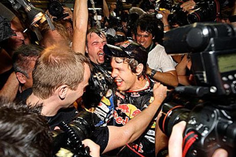 Vettel, seen here after winning the title last year in Abu Dhabi, does not think his crown will give him an advantage.