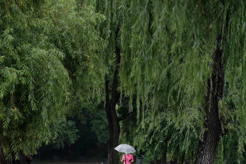 A visitor walks at the Gyeongbok Palace, one of South Korea's well-known landmarks, in Seoul, South Korea. AP Photo