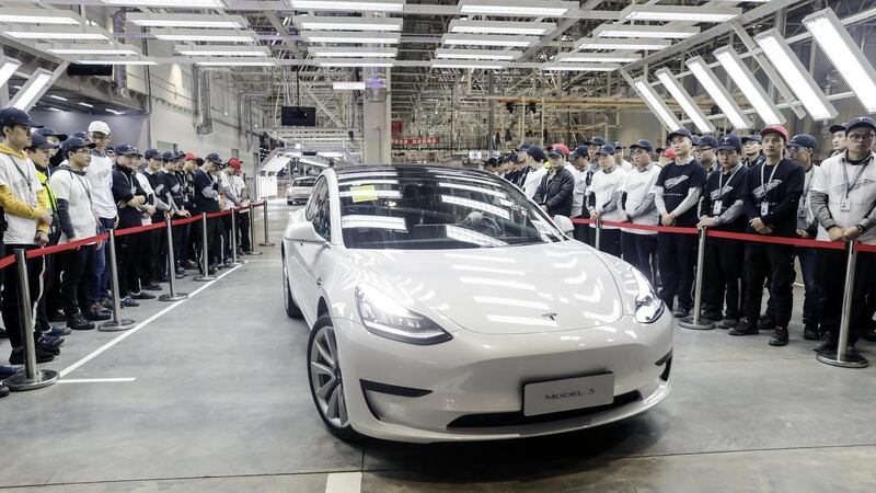 Tesla delivered 15 China-built Model 3 sedans to its employees in Shanghai in December 2019. Bloomberg