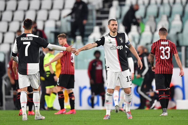 Leonardo Bonucci (R) and Cristiano Ronaldo celebrate at the end of the Coppa Italia semi-final. Getty