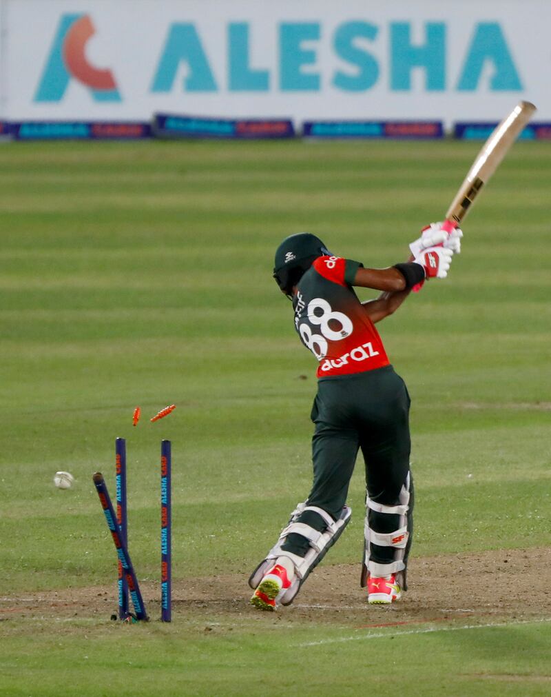 Bangladesh's Afif Hossain is bowled by Australia's Mitchell Starc.