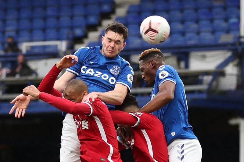 Everton defender Michael Keane heads home for Everton. AFP