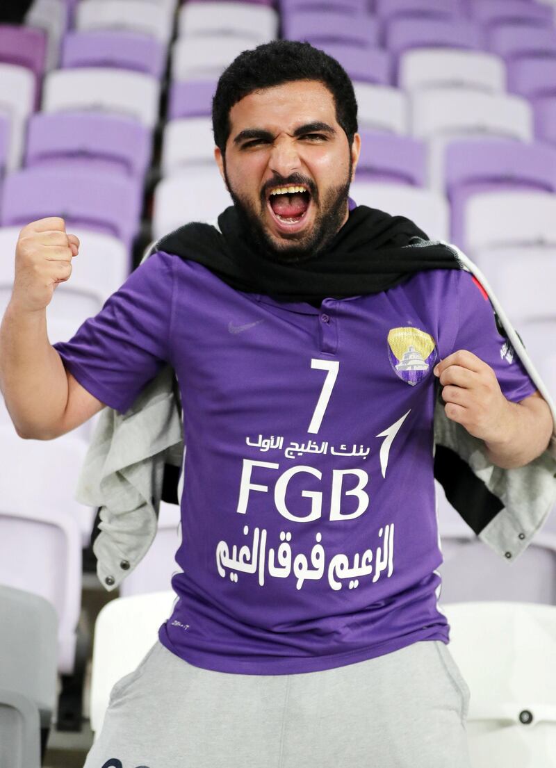 Al Ain, United Arab Emirates - December 18, 2018: An Al Ain fan celebrates winning the game after the match between River Plate and Al Ain in the Fifa Club World Cup. Tuesday the 18th of December 2018 at the Hazza Bin Zayed Stadium, Al Ain. Chris Whiteoak / The National