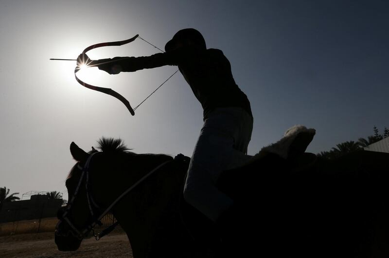 Coach Mohammad Abu Musaed says he wants to revive the sport of mounted archery 'because it helps release bad energy'. Reuters