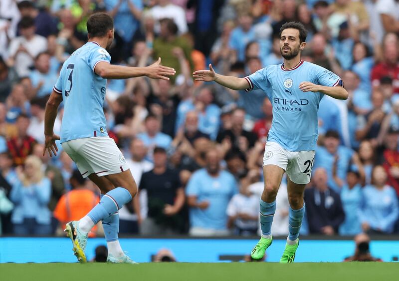 Manchester City's midfielder Bernardo Silva celebrates scoring his team's first goal. AFP