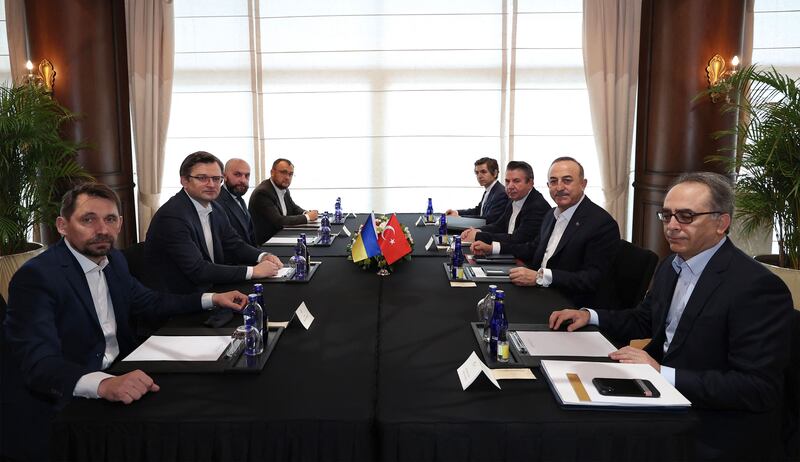 Turkish Foreign Minister Mevlut Cavusoglu, right, and Ukraine Foreign Minister Dmytro Kubela, second left, in Antalya, Turkey. AFP