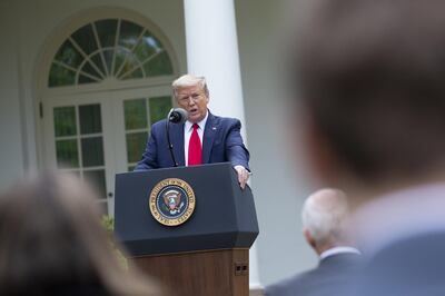U.S. President Donald Trump speaks during a news conference in the Rose Garden of the White House in Washington D.C., U.S. on Tuesday, April 14, 2020. Trump said he instructed his administration to temporarily halt funding to the World Health Organization, following up his claims that the international body has failed to share information about the coronavirus pandemic. Photographer: Stefani Reynolds/CNP/Bloomberg