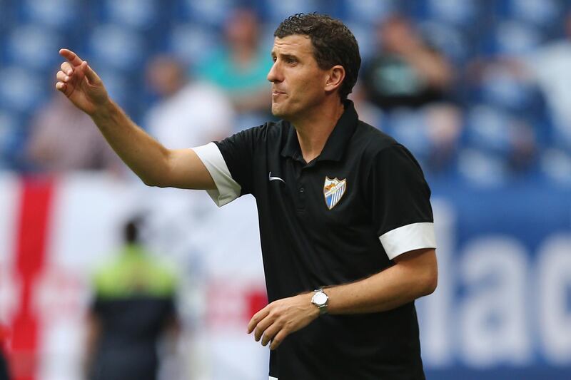 FILE: Watford Have Named Javi Gracia As Their New Head Coach. GELSENKIRCHEN, GERMANY - AUGUST 03: Head coach Javi Gracia of Malaga issues instructions during the match between FC Malaga and West Ham United as part of the Schalke 04 Cup Day at Veltins-Arena on August 3, 2014 in Gelsenkirchen, Germany.  (Photo by Christof Koepsel/Bongarts/Getty Images)