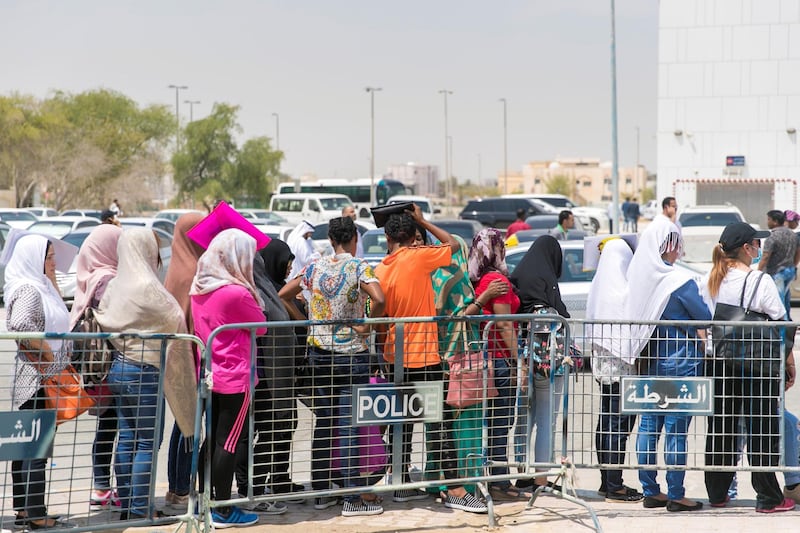 ABU DHABI, UNITED ARAB EMIRATES - AUGUST 5, 2018. 

Amnesty seekers at the Al Shahama immigration centre in Abu Dhabi.

Thousands of undocumented workers streamed into the center today as they sought to take advantage of the government's new amnesty law. 
 
(Photo by Reem Mohammed/The National)

Reporter: Anna Zacharias
Section:  NA
