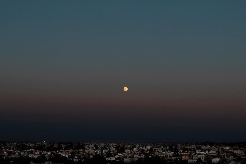 A full pink supermoon rises over Nicosia on the eastern Mediterranean island of Cyprus. AP Photo