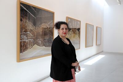 SHARJAH , UNITED ARAB EMIRATES , MARCH 15  – 2017 :- Zineb Sedira , artist with her work during the opening of the exhibition at Sharjah Art Foundation in Sharjah. ( Pawan Singh / The National ) For Arts & Life. Story by Melissa