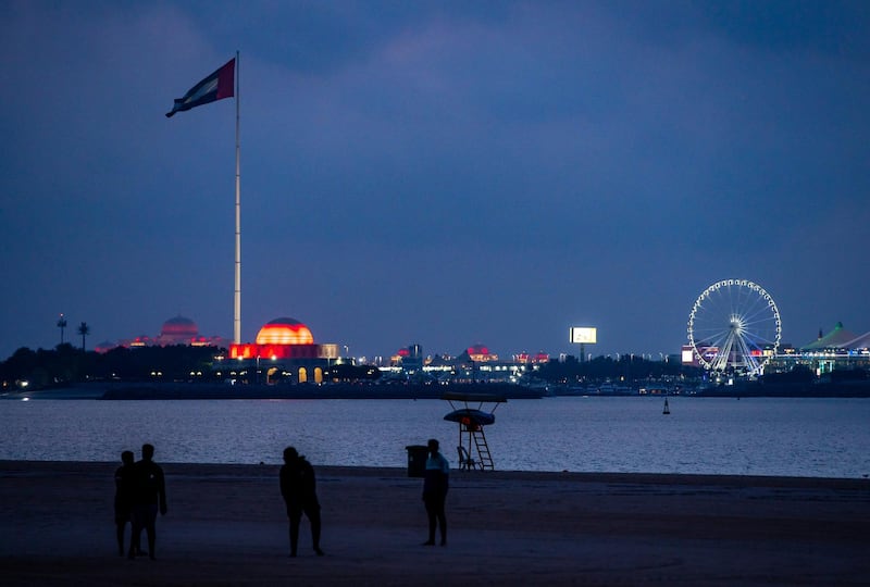 Abu Dhabi, United Arab Emirates, February 9, 2021.  The UAE Flag area on the Corniche lights up in red to show support for the success of the Hope probe going into orbit around Mars.  Victor Besa/The NationalSection:  NA