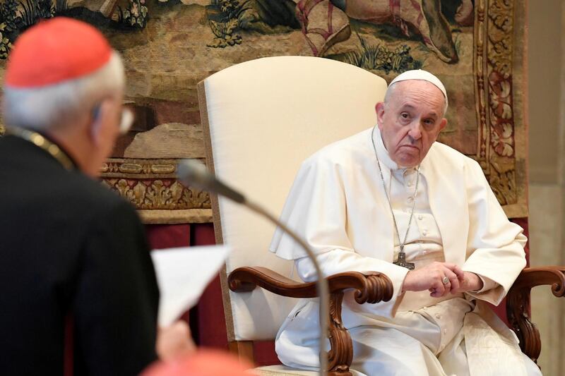 FILE PHOTO: Pope Francis listens during the traditional greetings to the Roman Curia at the Vatican, December 21, 2020.   Vatican Media/?Handout via REUTERS    ATTENTION EDITORS - THIS IMAGE WAS PROVIDED BY A THIRD PARTY./File Photo