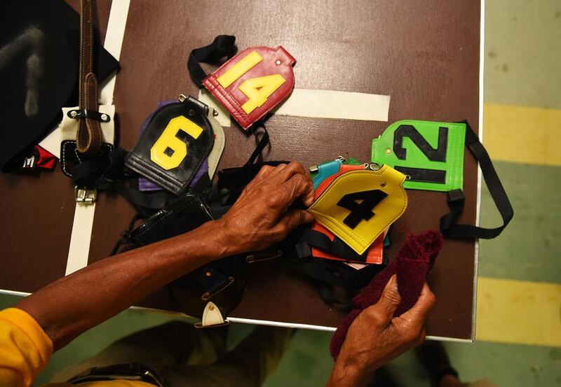 Numbers are prepared prior to the 139th running of the Preakness Stakes at Pimlico Race Course on Saturday. Patrick Smith / Getty Images / AFP / May 17, 2014