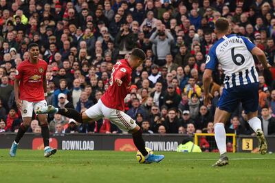 Manchester United's Belgian-born Brazilian midfielder Andreas Pereira (C) scores the opening goal during the English Premier League football match between Manchester United and Brighton and Hove Albion at Old Trafford in Manchester, north west England, on November 10, 2019. RESTRICTED TO EDITORIAL USE. No use with unauthorized audio, video, data, fixture lists, club/league logos or 'live' services. Online in-match use limited to 120 images. An additional 40 images may be used in extra time. No video emulation. Social media in-match use limited to 120 images. An additional 40 images may be used in extra time. No use in betting publications, games or single club/league/player publications.
 / AFP / Oli SCARFF                           / RESTRICTED TO EDITORIAL USE. No use with unauthorized audio, video, data, fixture lists, club/league logos or 'live' services. Online in-match use limited to 120 images. An additional 40 images may be used in extra time. No video emulation. Social media in-match use limited to 120 images. An additional 40 images may be used in extra time. No use in betting publications, games or single club/league/player publications.

