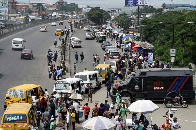 A police armoured vehicle is deployed at a bus station at a boundary between Lagos and neighbouring Ogun State, Nigeria. Police are being accused of  AFP