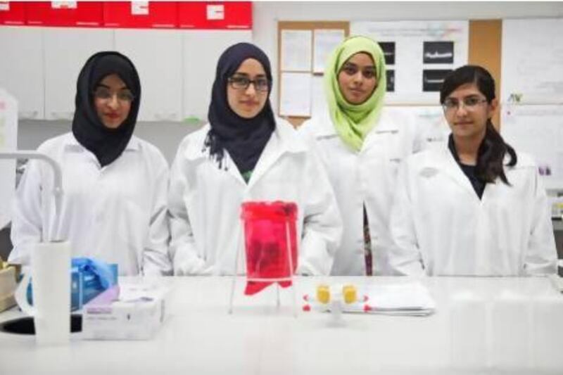 From left, Shatha Al Wahhabi, Noaf Salah, Enas Azhari and Zainab Moazzam, students from Khalifa University, were selected to take part in a summer paediatric research programme in Washington DC. Lee Hoagland / The National