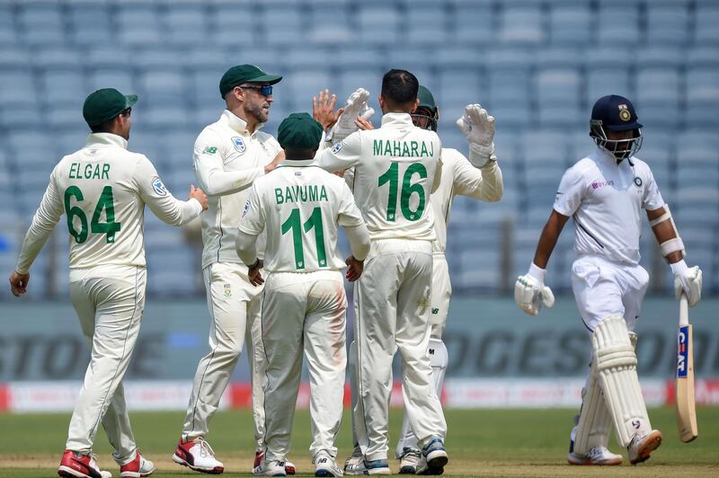 South Africa celebrate after the dismissal of India's Ajinkya Rahane, right. AFP