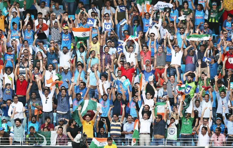 DUBAI , UNITED ARAB EMIRATES, September 19 , 2018 :- Supporters of India and Pakistan making a wave during the Asia Cup UAE 2018 cricket match between Pakistan vs India held at Dubai International Cricket Stadium in Dubai. ( Pawan Singh / The National )  For News/Sports/Instagram/Big Picture. Story by Paul 