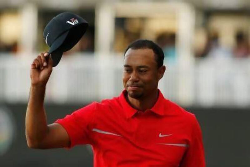 Tiger Woods celebrates after his two-stroke victory at the World Golf Championships-Cadillac Championship at the Trump Doral Golf Resort & Spa in Doral, Florida on Sunday. Scott Halleran / Getty Images