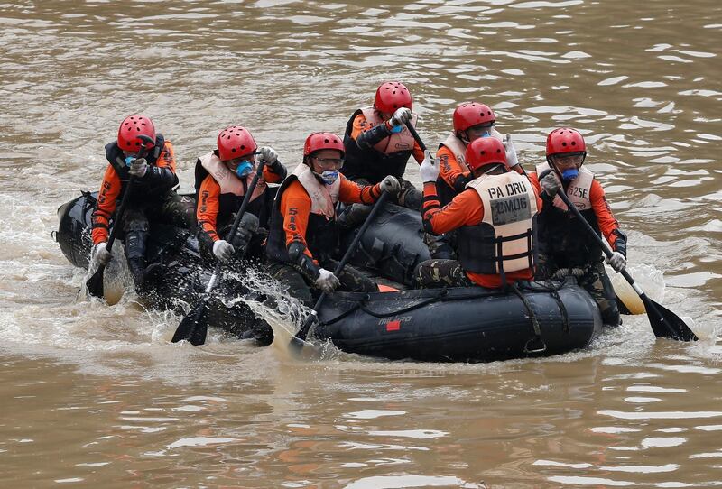 Philippine Army soldiers hold drills along the banks of the Marikina River, east of Manila. EPA