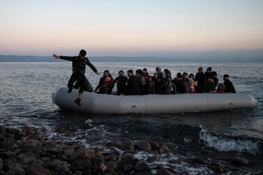 Migrants from Afghanistan arrive by dinghy to a beach near the village of Skala Sikamias, Lesbos, after crossing part of the Aegean Sea from Turkey to reach the Greek island. Reuters