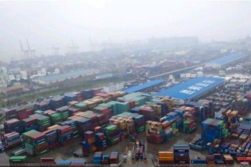 Containers are stacked at the Dayaowan Bonded Port Area in Dalian, China. Nelson Ching / Bloomberg