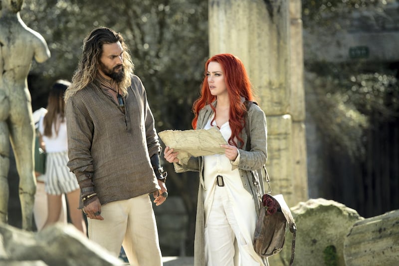 After speaking out about domestic abuse, Amber Heard feared she would lose her roles in the movies 'Justice League' and 'Aquaman', the latter of which she starred in opposite Jason Momoa. Photo: DC Entertainment