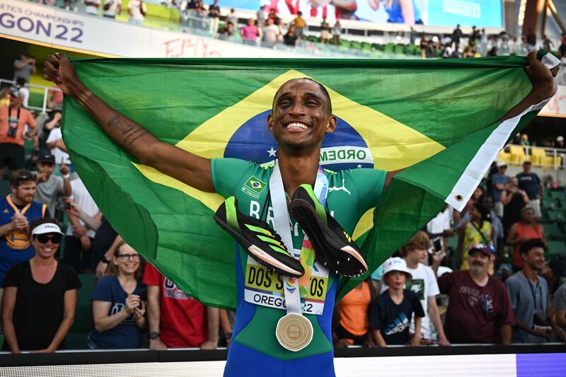 Alison Dos Santos celebrates after winning the men's 400m hurdles final during the World Athletics Championships. AFP