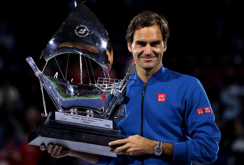 DUBAI, UNITED ARAB EMIRATES - MARCH 02: Rodger Federer of Switzerland poses with the winners trophy after victory during day fourteen of the Dubai Duty Free Championships at Dubai Tennis Stadium on March 02, 2019 in Dubai, United Arab Emirates. (Photo by Francois Nel/Getty Images)