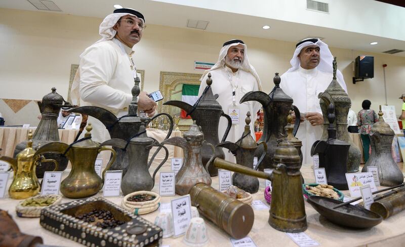 Exhibitors display vintage items at the summer festival of heritage and handicraft in Kuwait City, Kuwait. EPA