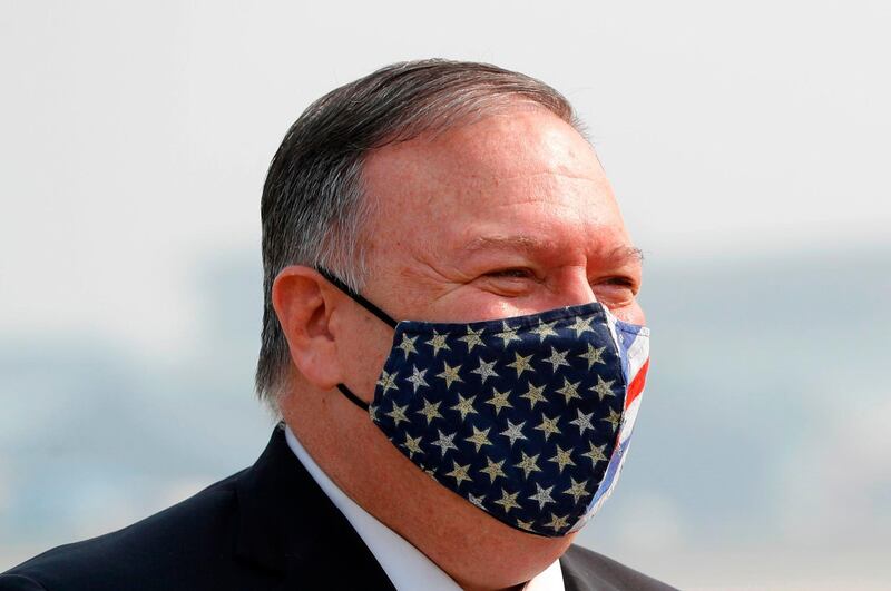 US Secretary of State Mike Pompeo arrives at an airport in New Delhi on October 26, 2020. / AFP / POOL / ADNAN ABIDI
