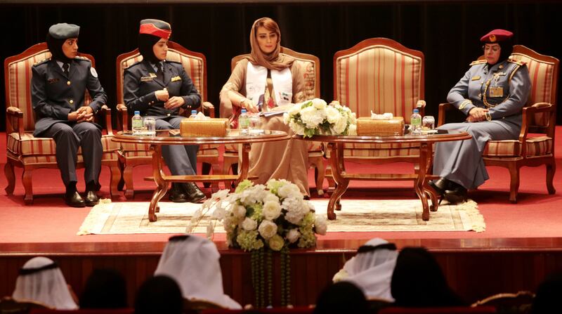 From left, First Lt Asma Al Mulla, platoon leader and national service trainer for women, Maj Latifa Al Zaidi, Nada Al Shaibani, moderator and Abu Dhabi TV anchor, and Maj Amna Al Bloushi, president of the Women’s Police Association and director of the Regional Women’s Police Force, attend a panel discussion at an event celebrating Women’s Day in Abu Dhabi. Christopher Pike / The National