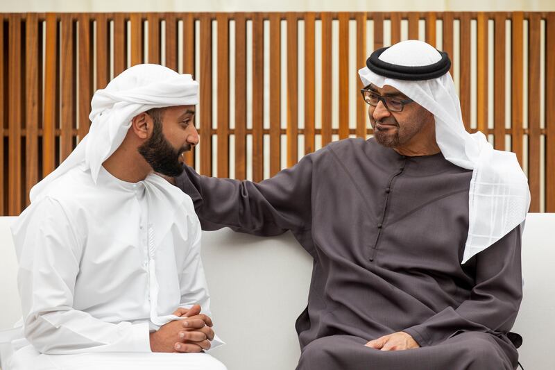 President Sheikh Mohamed and Sheikh Khaled bin Sultan bin Zayed, receiving condolences for the late Sheikh Hazza bin Sultan bin Zayed, on Friday. UAE Presidential Court. Ryan Carter / UAE Presidential Court 
