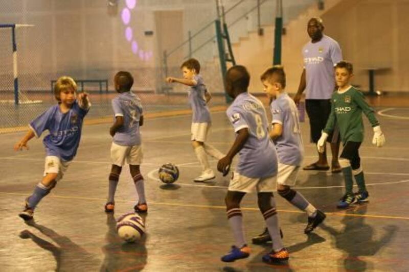 DUBAI, UNITED ARAB EMIRATES Ð July 13: Players of the Desert Rangers football team during the practice at Soccer Circus in Mirdiff City Center in Dubai. (Pawan Singh / The National) For News. Story by Eugene 
