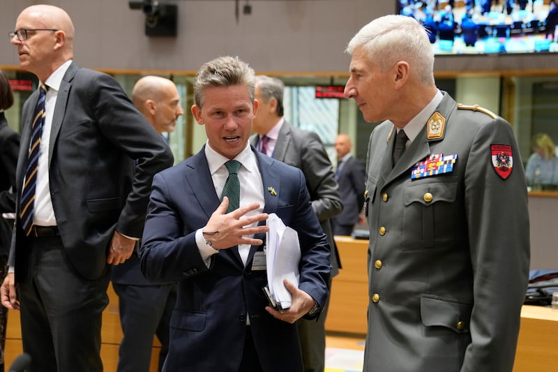 Sweden's Defense Minister Pal Jonson, centre, said that his country joining Nato would boost the stability and security of the alliance. AP