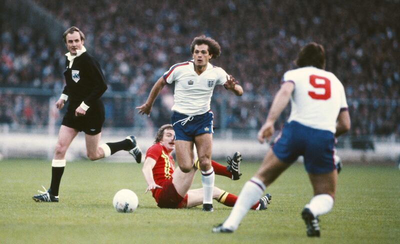 Ray Wilkins, while playing for England, skips the challenge of John Mahony of Wales during the goaless draw in the British Home International Championships match at Wembley Stadium on May 23, 1979 in London, England. Steve Powell / Getty Images