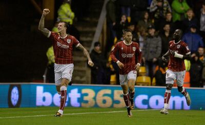 Soccer Football - Championship - Wolverhampton Wanderers vs Bristol City - Molineux Stadium, Wolverhampton, Britain - September 12, 2017  Bristol City's Aden Flint celebrates scoring their first goal  Action Images/Alan Walter  EDITORIAL USE ONLY. No use with unauthorized audio, video, data, fixture lists, club/league logos or "live" services. Online in-match use limited to 75 images, no video emulation. No use in betting, games or single club/league/player publications. Please contact your account representative for further details.