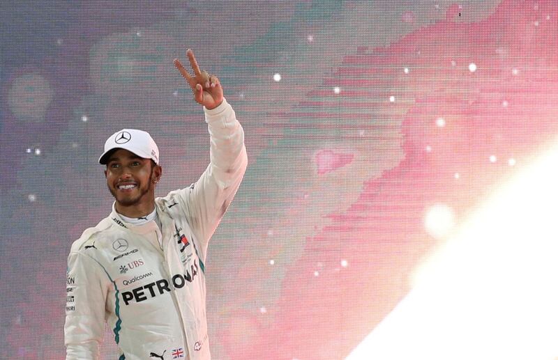 Formula One F1 - Abu Dhabi Grand Prix - Yas Marina Circuit, Abu Dhabi, United Arab Emirates - November 25, 2018  Mercedes' Lewis Hamilton celebrates winning the race  REUTERS/Ahmed Jadallah     TPX IMAGES OF THE DAY