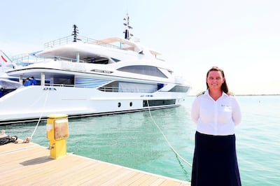 Patricia Caswell, the only female boat captain in the UAE, one of only a few hundred worldwide at the Gulf Craft in Umm Al Quwain on April 28,2021. Pawan Singh / The National