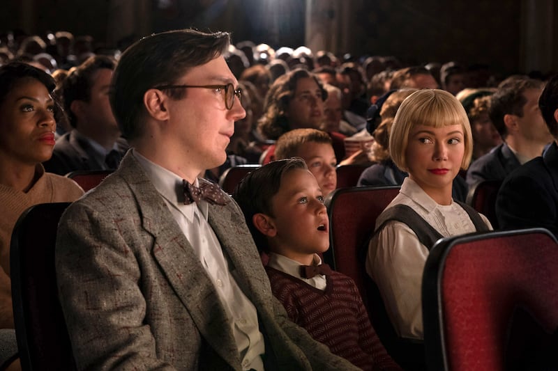 Paul Dano, Mateo Zoryon Francis-DeFord and Michelle Williams in a scene from The Fabelmans. AP