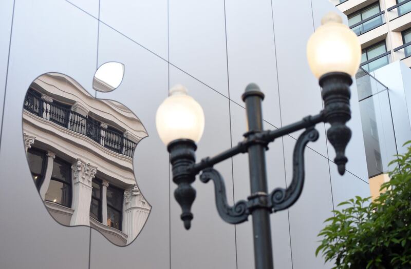 (FILES) In this file photo taken on September 22, 2017 an Apple logo is seen on the outside of an Apple store in San Francisco, California.
With Apple set to report quarterly results February 1, 2018 investors and others are cautiously watching to see whether its newest iPhone will help fuel momentum for the world's most valuable company.Despite Apple's spectacular trajectory in the decade since the introduction of the iPhone, the California technology titan is facing challenges on whether it can continue growth. Apple could also start making money from sales of voice-commanded HomePod speakers infused with Siri virtual assistant software. HomePod will make a belated debut this year, taking on Amazon Echo and Google Home devices. / AFP PHOTO / Josh Edelson