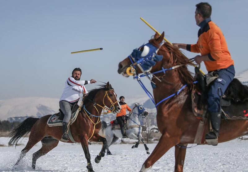 A jereed player launches a javelin at an opponent during a game in Erzurum, Turkey. Modern javelins are usually made of light poplar wood and tipped with rubber to reduce injuries.  EPA