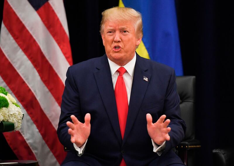 TOPSHOT - US President Donald Trump speaks during a meeting with Ukrainian President Volodymyr Zelensky in New York on September 25, 2019, on the sidelines of the United Nations General Assembly. / AFP / SAUL LOEB
