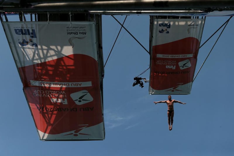 Artem Silchenko of Russia competes during the finals of the Fina High Diving World Cup on the breakwater along the Corniche in Abu Dhabi on February 29, 2016. Christopher Pike / The National