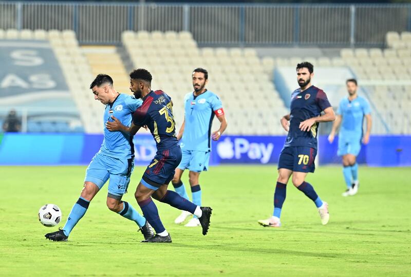 Action from Baniyas v Al Wahda in the Arabian Gulf League.