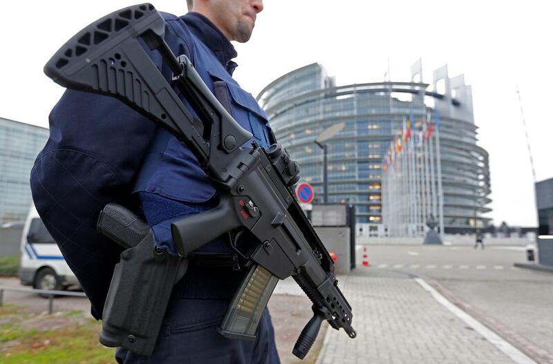 A French policeman stands guard in front of the European Parliament in Strasbourg, France, on November 21, 2016, as the country remains on heightened alert following a string of terror attacks since last year. Vincent Kessler / Reuters
