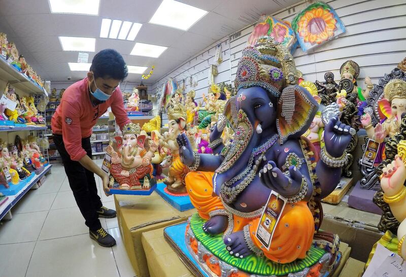 DUBAI, UNITED ARAB EMIRATES , August 17 – 2020 :- Colourful Ganesh statues made by plaster of paris on display at the Madhoor store in Bur Dubai in Dubai. Ganesh Festival will start on 22nd August. Authorities in the UAE are advising the Indian community to limit the number to immediate family members to prevent the spread of the coronavirus. (Pawan Singh / The National) For News/Online/Instagram. Story by Ramola